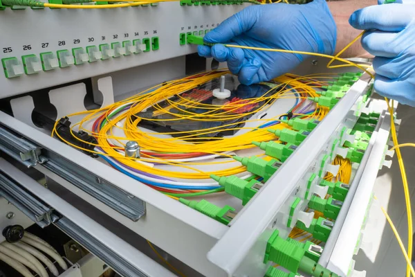 https://torontohometech.com/wp-content/uploads/2025/02/depositphotos_582242276-stock-photo-telecommunication-equipment-technician-switching-fiber.webp