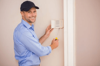 https://torontohometech.com/wp-content/uploads/2025/02/depositphotos_60921511-stock-photo-handyman-fixing-an-alarm-system.png
